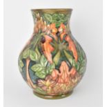 A Moorcroft pottery 'Flame of the Forest' vase designed by Philip Gibson, 1997, shape 869/9, of