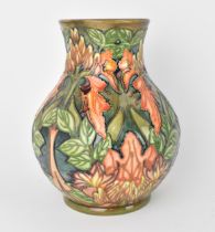 A Moorcroft pottery 'Flame of the Forest' vase designed by Philip Gibson, 1997, shape 869/9, of