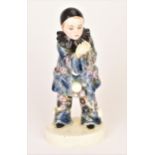 An early 20th century Goldscheider Vienna pottery figure of 'Pierrot', designed by Adolphe Jean