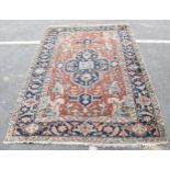 A Tabriz carpet with a central medallion, geometric palmets, flowers, vines and spandrels in