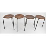 A set of four Arne Jacobsen for Fritz Hansen style 'Dot' stools, with circular seat rests on