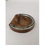 Robert 'Mouseman' Thompson of Kilburn (1876-1955), a carved oak and steel horseshoe pin tray, with