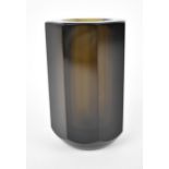 A contemporary Daum glass vase, in smoky quartz with faceted tubular body, the underside with etched