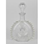 A Baccarat for Remy Martin cognac bottle, of flat circular form with pressed fleur de lys motifs