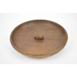 Robert 'Mouseman' Thompson of Kilburn (1876-1955), a carved oak bowl, of circular form with adzed