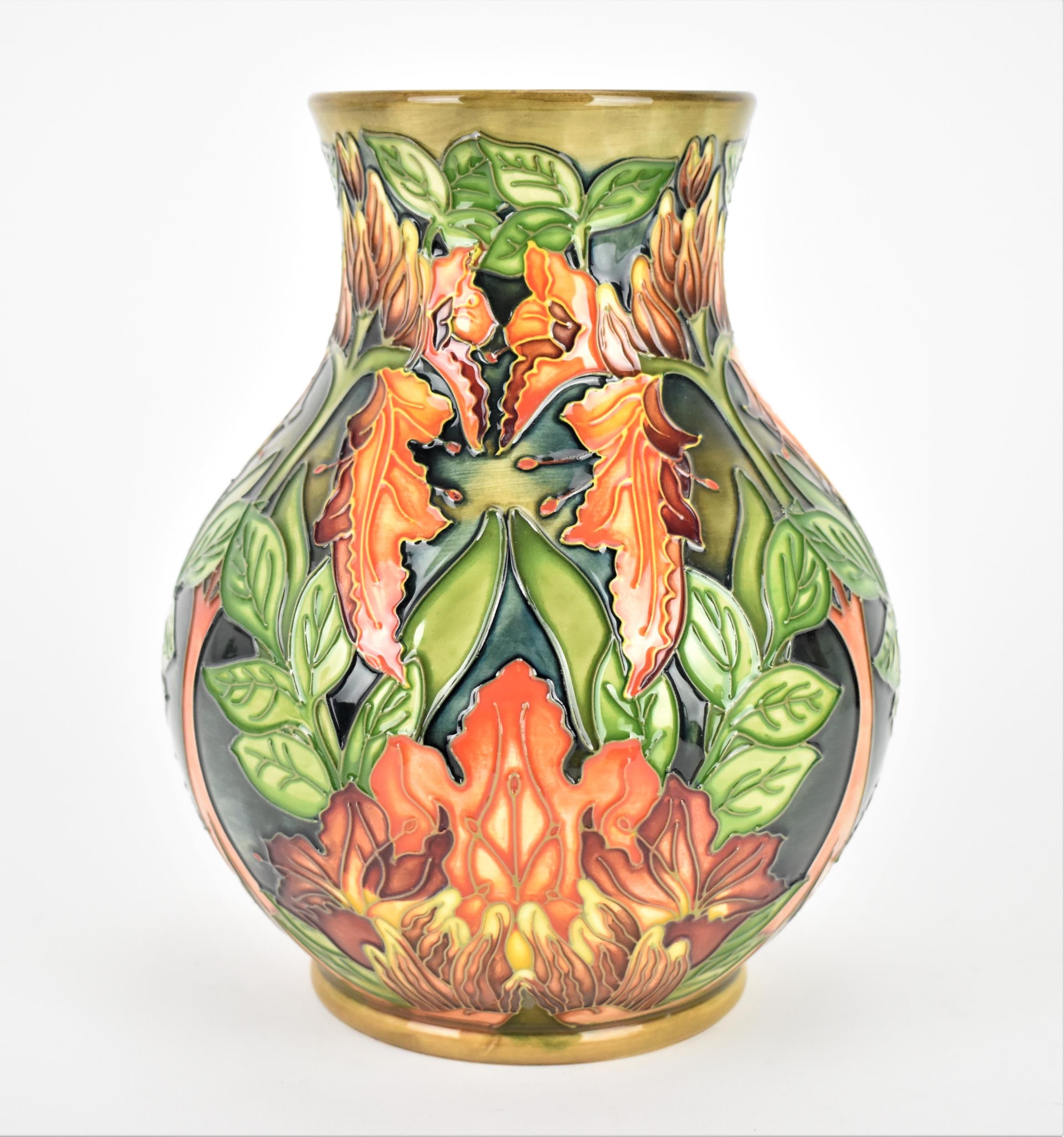 A late 20th century Moorcroft pottery vase designed by Philip Gibson, in the 'Flame of the Forest'