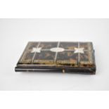 A Victorian tortoiseshell, mother of pearl and white metal pique wallet, the inside with blue silk