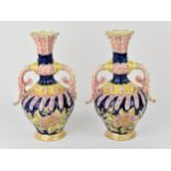 A pair of late 19th century Zsolnay Pecs glazed ceramic pair of ewers, in the Turkish style with