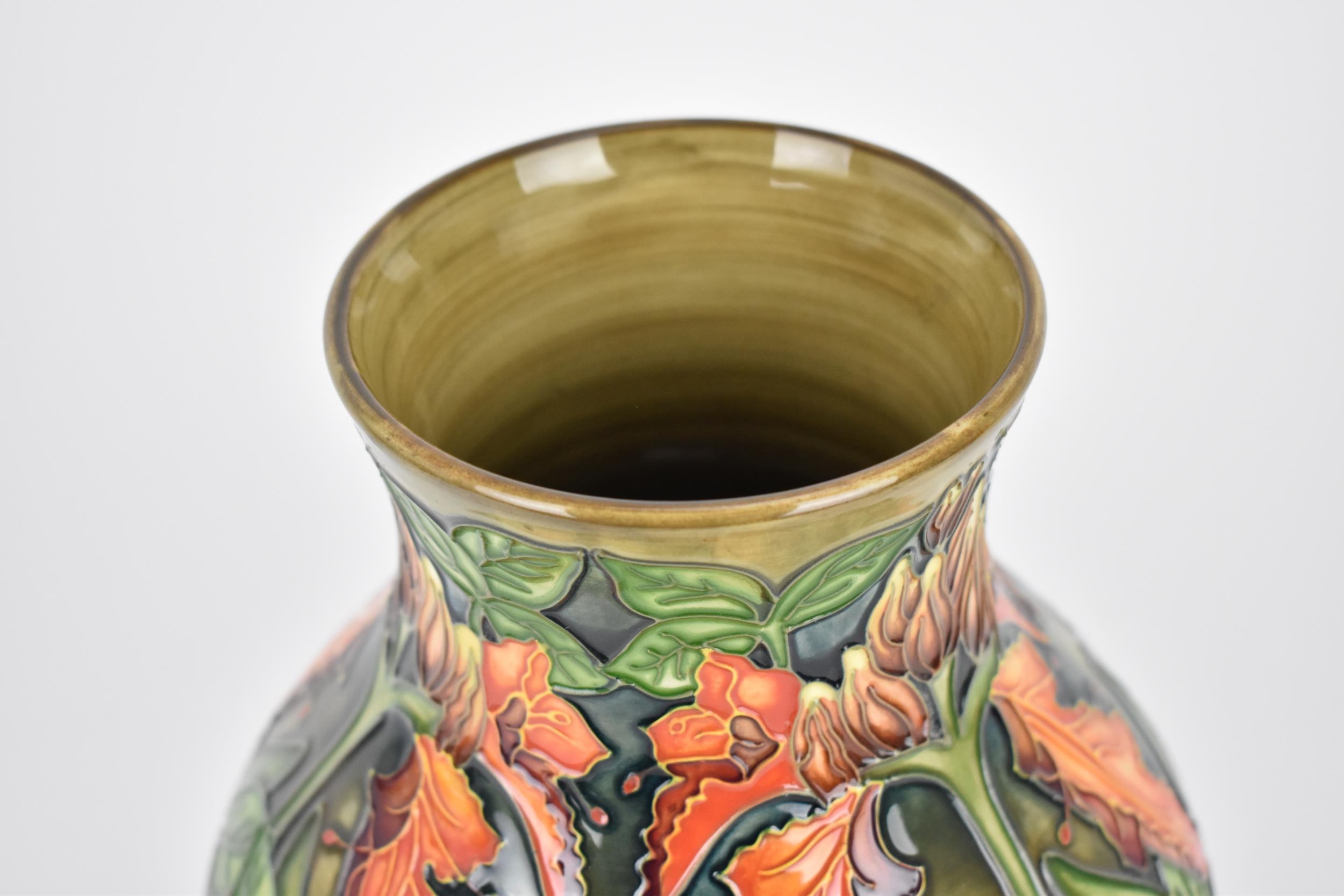 A late 20th century Moorcroft pottery vase designed by Philip Gibson, in the 'Flame of the Forest' - Image 5 of 5