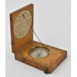 A 19th century pocket sun dial and compass, within wooden case, the top with etched plate 'Hutton