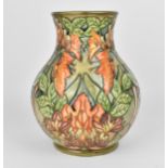 A Moorcroft pottery 'Flame of the Forest' vase designed by Philip Gibson, 1997, shape 869/9, of