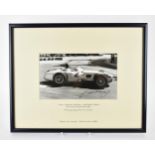 A signed reprinted photograph of Juan Manuel Fangio, racing a Mercedes Benz, Grand Prix de Monaco