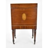 A George III mahogany cellarette, circa 1790, of rectangular form with inlay and box stringing,
