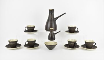 ? Dame Lucie Rie DBE (1902-1995), a stoneware coffee set, comprising a coffee pot, milk jug, sugar
