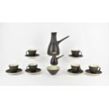 ? Dame Lucie Rie DBE (1902-1995), a stoneware coffee set, comprising a coffee pot, milk jug, sugar