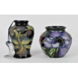 A Moorcroft pottery 'Anemone Tribute' vase, designed by Emma Bossons, with tube lined flowers and