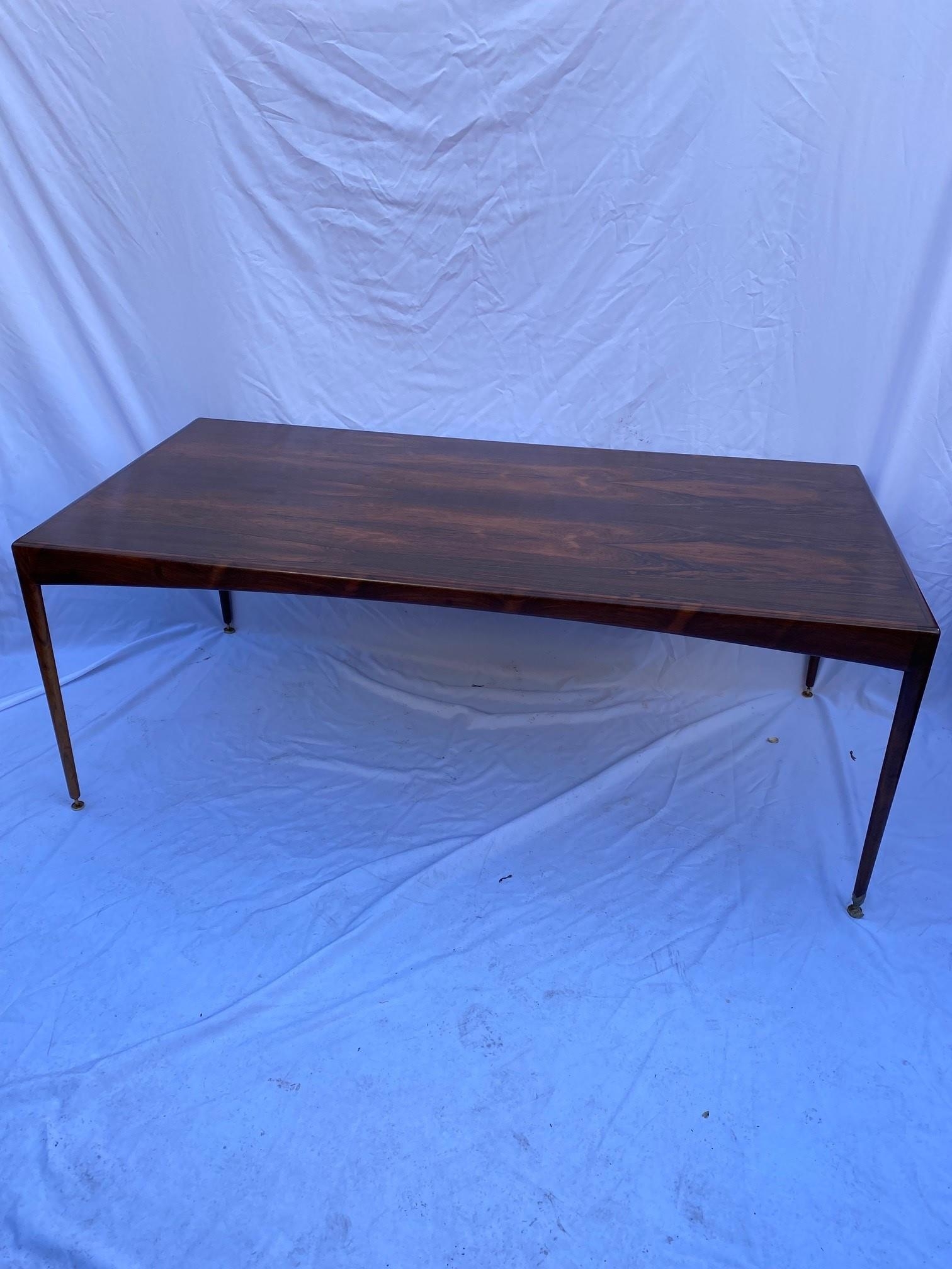 A Heals rosewood dining table, of rectangular form with tapered legs ending in brass disc feet, - Image 2 of 8