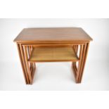 Johannes Andersen for Silkeborg Denmark, circa 1970s, a nest of three rectangular teak tables, the