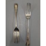 Two early 19th century silver dinner forks hallmarked London 1810 and 1817, 127.1g Location: Cab