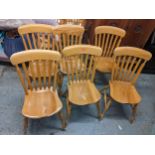 A set of six Stewait Linford beech and elm kitchen lath back dining chairs Location:
