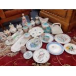 Mixed Poole pottery to include an hors d'oeuvre dish, and fish plates and seven table lamps