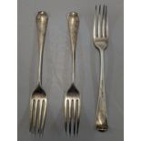 Three George III silver dinner forks, one example hallmarked London 1791, and the other two London