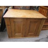 A large Victorian pine two door cabinet having panelled doors and single shelf, 81.5cm h x 116.5cm w