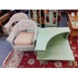 Two wicker armchairs together with a green painted corner table Location: A4F