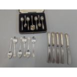 A cased set of six silver teaspoons and one other, together with six loose silver teaspoons, and a