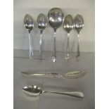 Seven mixed silver spoons to include a honey spoon, hallmarked Sheffield 1965, 113.2g Location: