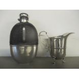 A silver and glass hip flask and a silver cream jug, 77g Location: