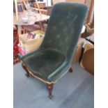 A Victorian salon chair with green upholstery Location: A1M