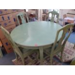 A green painted dining table and six dining chairs Location: A4B