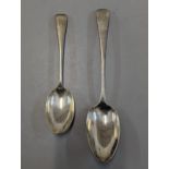 A George III silver tablespoon with monogram, London 1812, together with a late Victorian example,