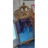 A Rococo style gilt wall mirror Location: RWM