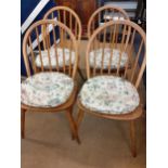 Four Ercol light beech and elm hoop spindle back dining chairs Location: A3F