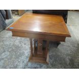 An early 20th century inlaid with bone and ebony occasional table with a square column and four