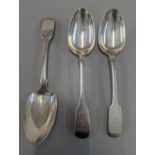 Three silver dinner spoons each with E monogram, to include a pair dated London 1824, and one