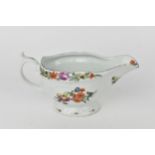 A late 18th century Worcester porcelain sauceboat, with hand painted polychrome floral sprays to the