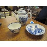 18th century Worcester blue and white teapot and cover, a Caughley tea bowl, each decorated in a