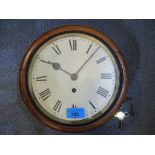 A Victorian mahogany cased wall hanging dial clock with white enamelled Roman dial (with pendulum