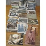 A selection of mainly early 20th century postcards, some depicting nude females Location: