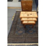A set of retro nesting tables and a folding side table, together with a blue ground hand woven