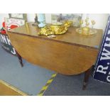 A Georgian mahogany D-end gateleg dining table on turned legs, 72cm h x 128cm w Location: