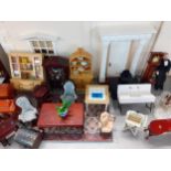 A large quantity of mixed wooden and plastic dolls house furniture to include 3 Willitts Design