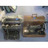 An Underwood vintage typewriter, and a wooden cased Singer sewing machine model 99K serial number