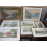 A quantity of framed and glazed, and unframed Victorian and later watercolours to include a river