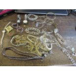 A selection of costume jewellery and ladies wristwatches to include bracelets, necklaces, earrings