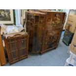 A mid 20th century walnut veneered cocktail cabinet in the Oriental design, 119cm h x 127cm w,