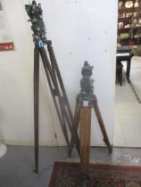 Two Hilger & Watts theodolites cased and with wooden tripod stands